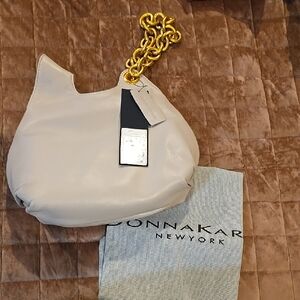 Authentic Donna Karan Cream Hobo Bag with Gold Chain..eith Butter Soft Leather.